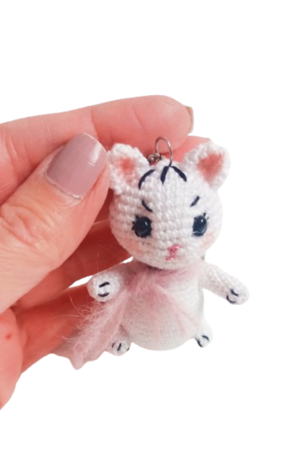 Step-by-step crochet pattern to make your own plush cat.