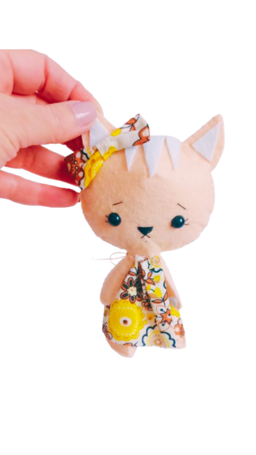 Hand-sewn felt cat doll with embroidered face and floral dress