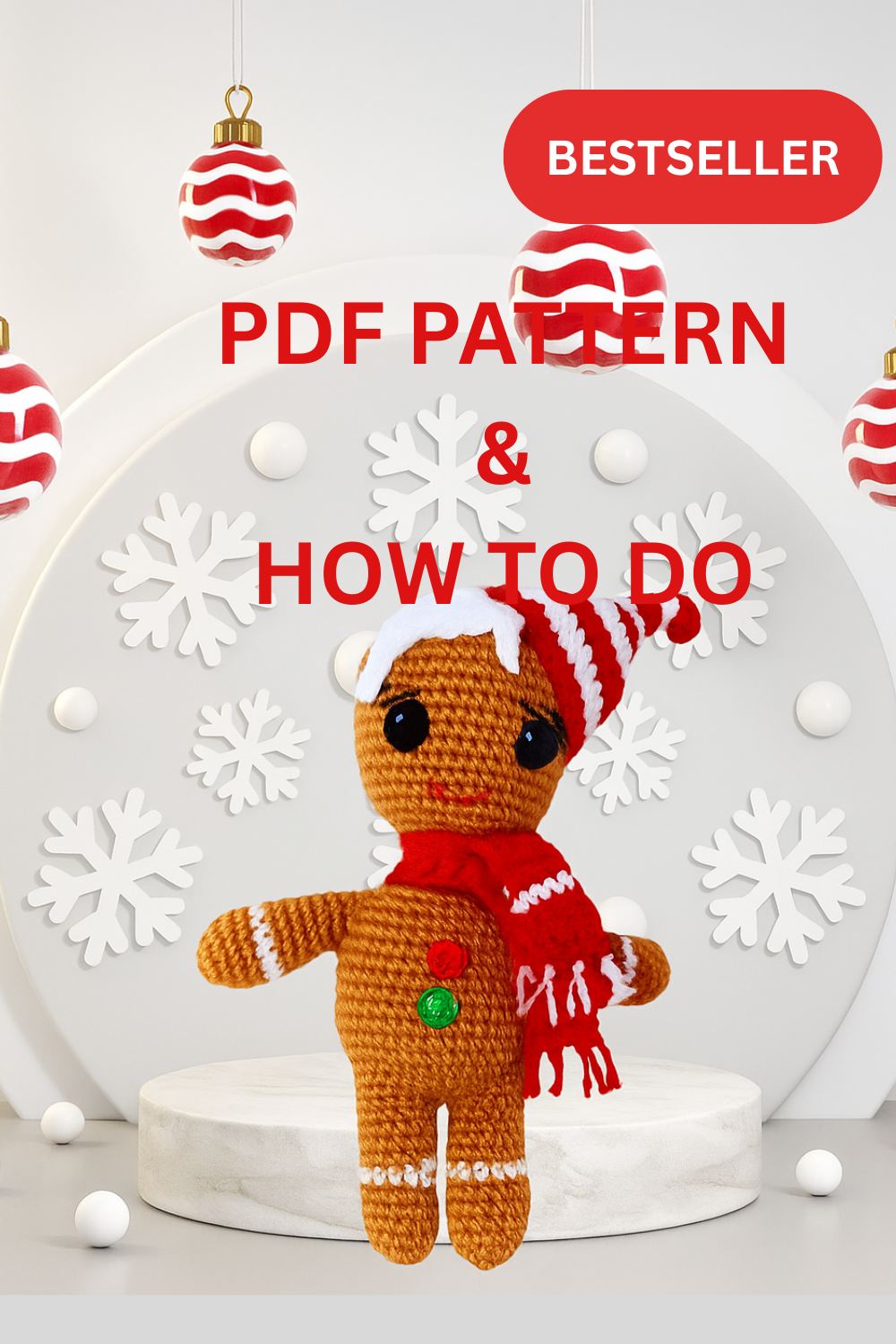 Crocheted gingerbread man toy with a red scarf and white hat on a white background with snowflakes and Christmas ornaments.