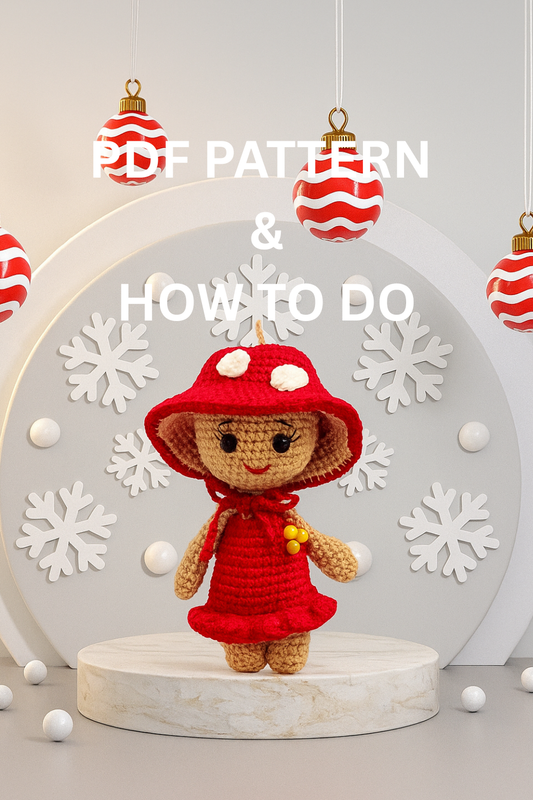 Crocheted mushroom ornament doll in a red outfit with Christmas decorations on a light background