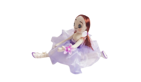 Textile ballerina doll with purple tutu and hand-painted facial features
